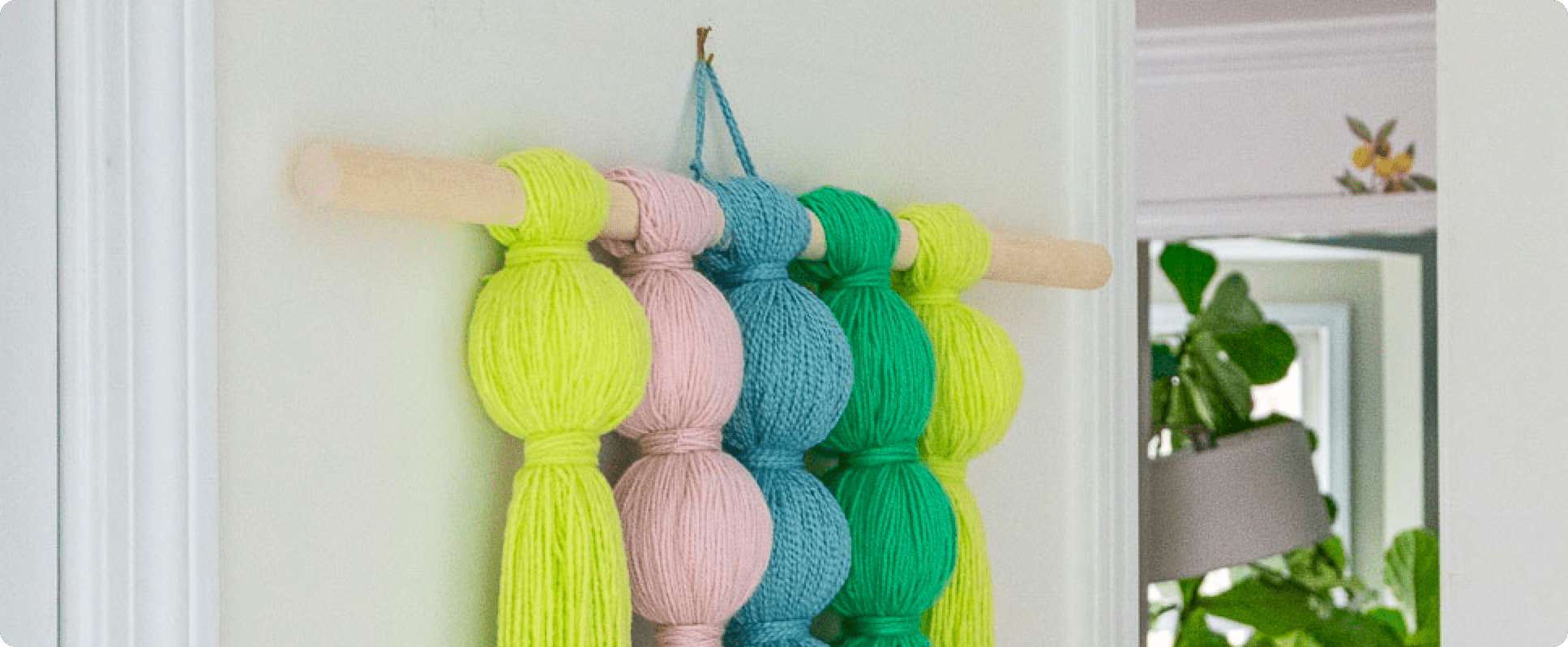 How to Make a Yarn Ball Wall Hanging